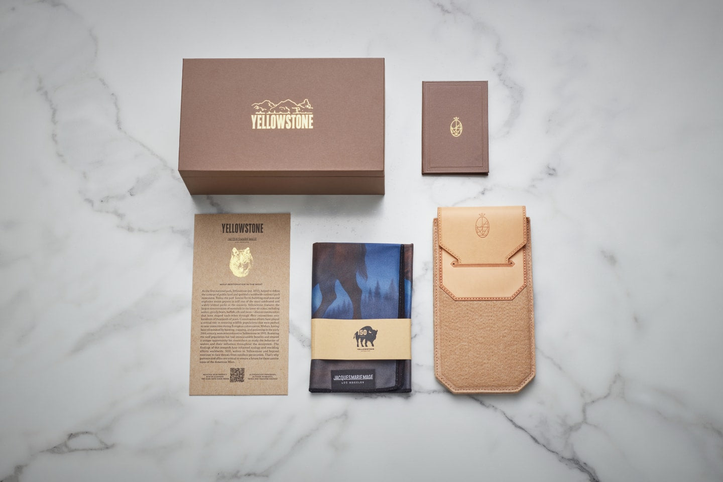 The Jacques Marie Mage x Yellowstone VI collection eyewear comes with an eco-friendly monograph box in brown with gold foil, JMM's signature warranty booklet, Yellowstone soft case, which is composed of lather and eco-friendly felt, a Yellowstone microfiber cleaning cloth, and a certificate of authenticity with limited edition serial number.