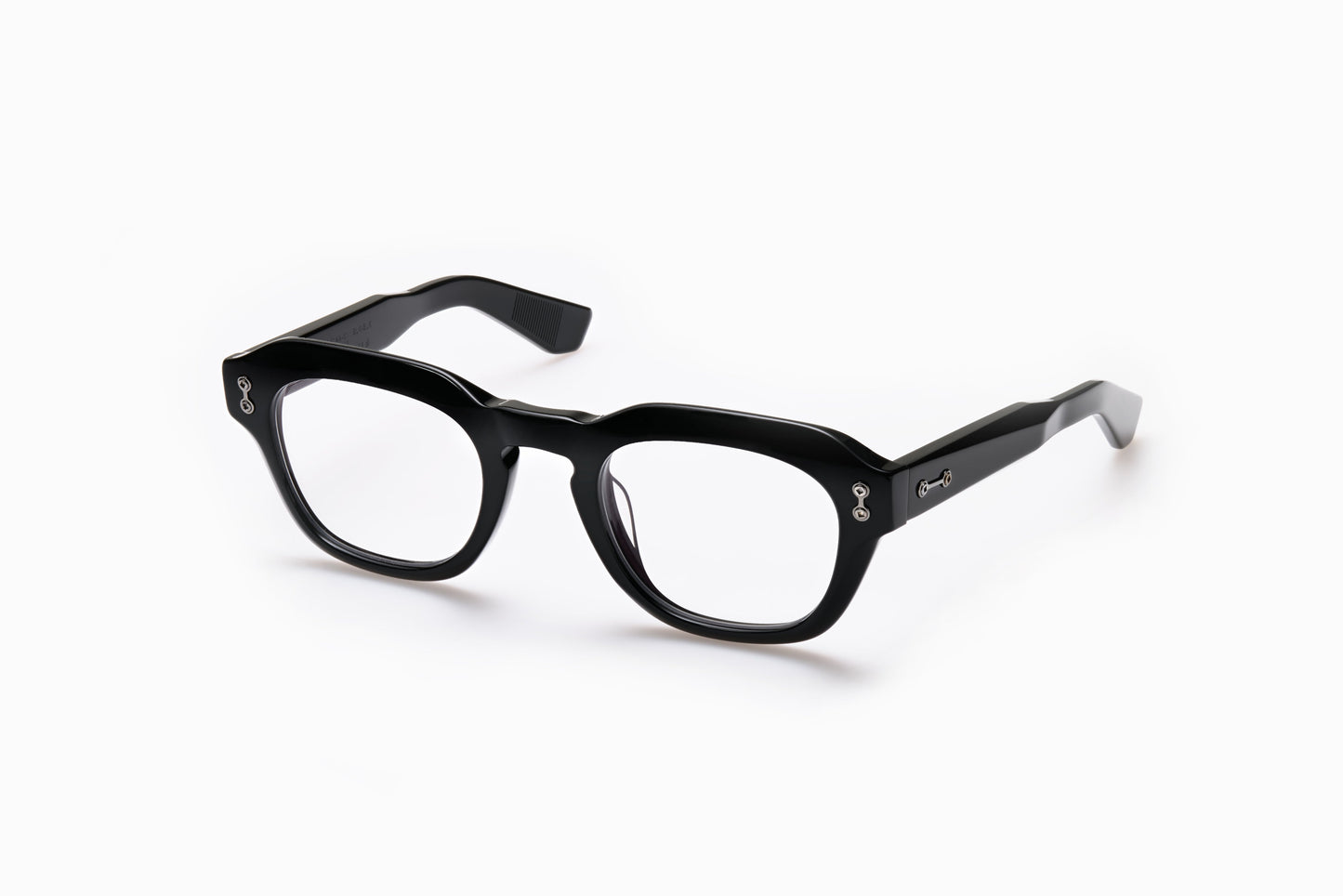 Side view of Akoni Blaze eyeglasses in the Black colorway. The frame has a polished finish with subtle tonal variations, and the temples feature minimal metallic accents for a refined look.