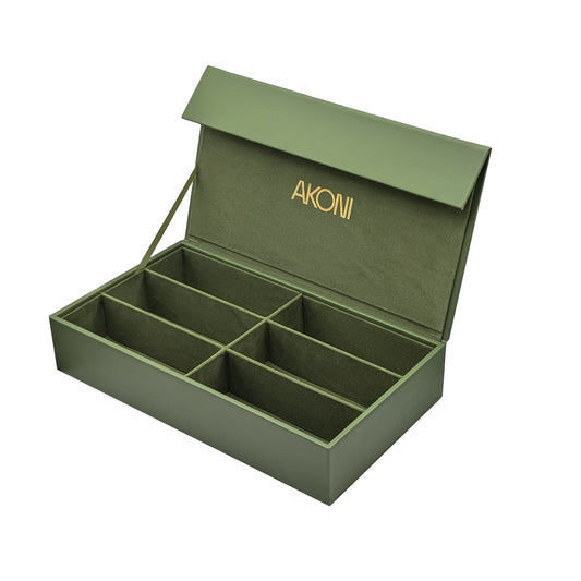 Akoni Collector Box in green leather open and showing the six storage compartments.