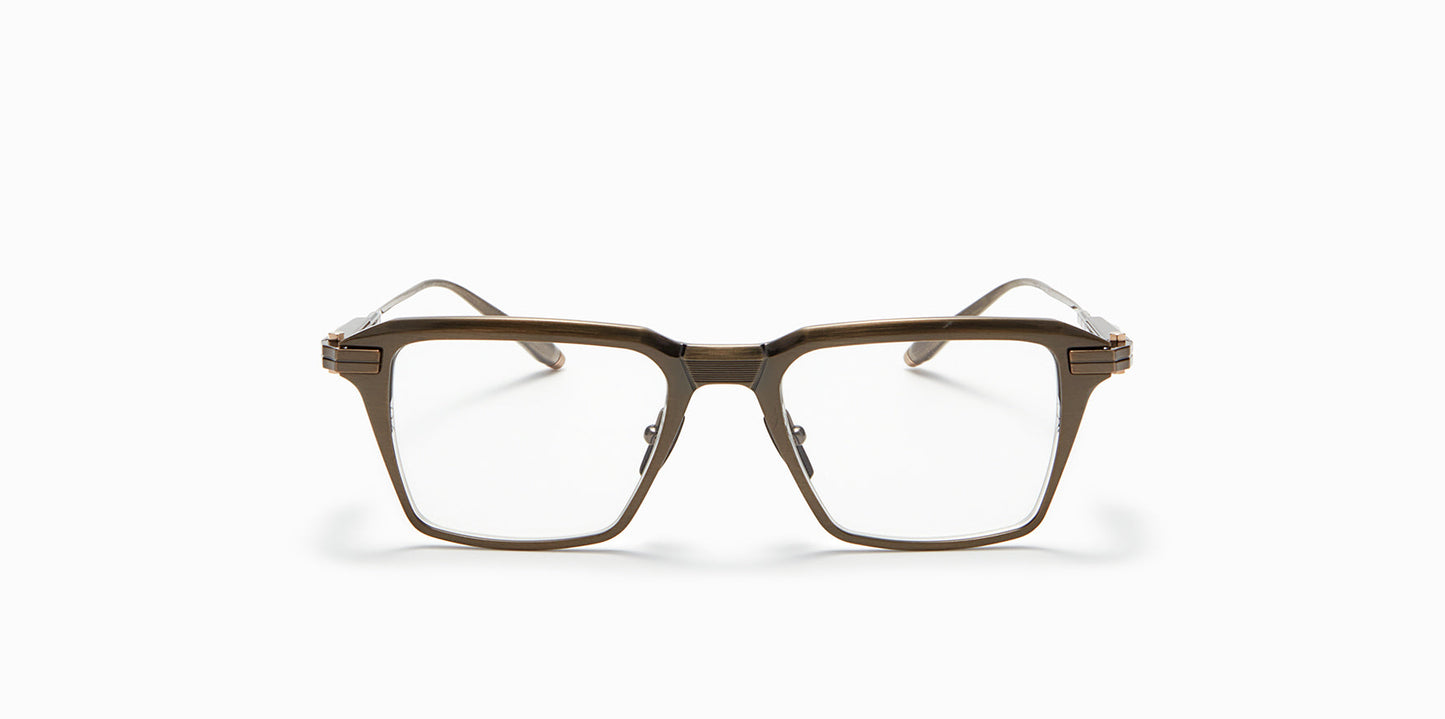 Front view of Akoni's Swift frame in the antiqued white gold colorway.