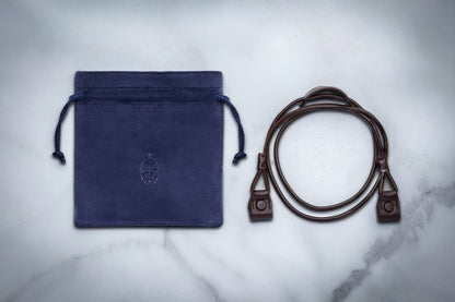 The 1992 is accompanied by custom leather eyewear straps. - Alternate View