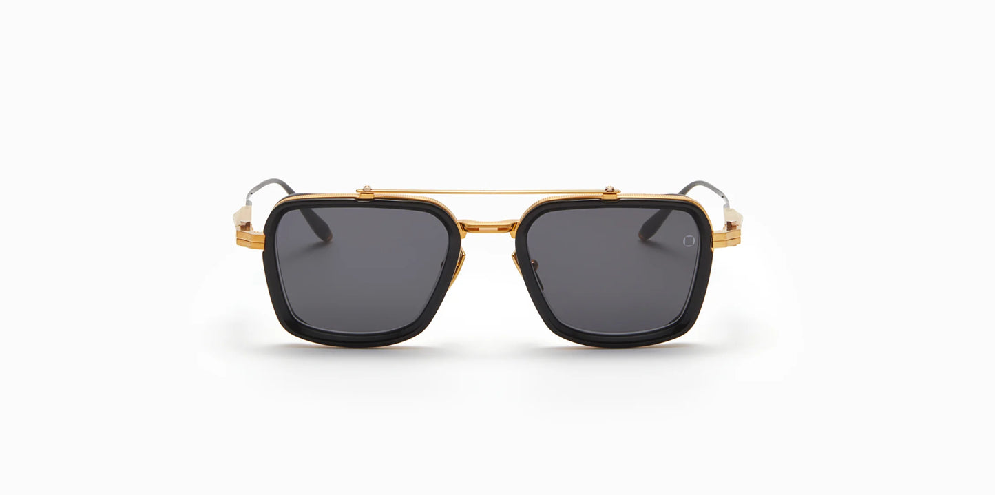 Front view of Akoni's new "Solis" frame in the black and gold colorway, a squared-off navigator silhouette with adjustable temples and a sculpted Japanese Acetate front set within a striking Japanese Titanium frame.